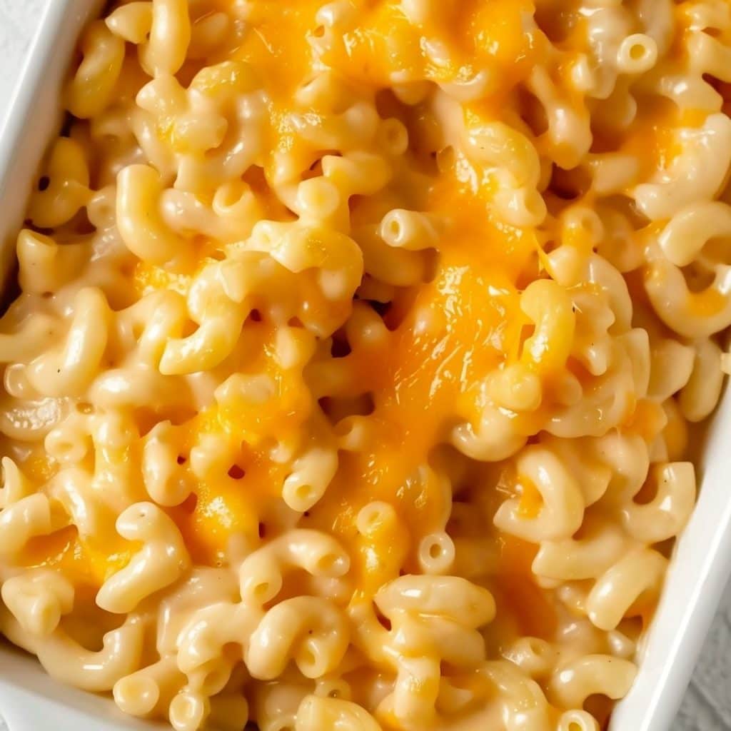 Copycat Boston Market mac and cheese in a baking dish topped with melted cheese, top view