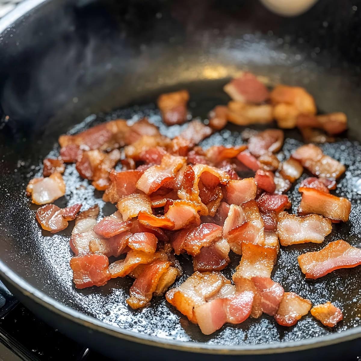 Cooked bacon in a skillet.