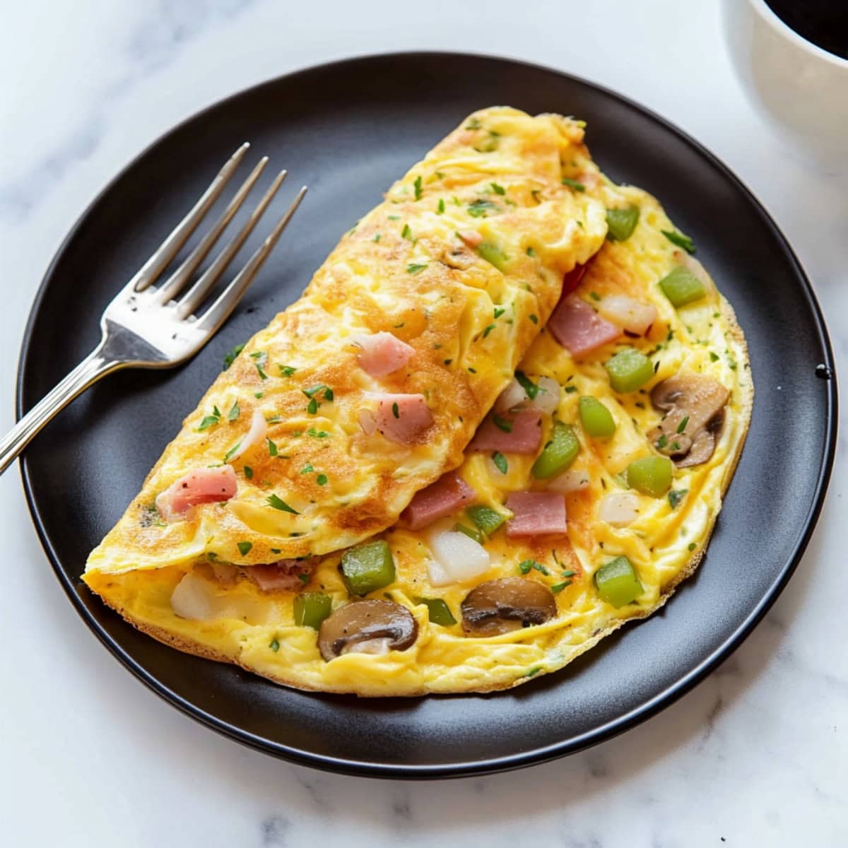 Savory denver omelette with ham and vegetables.