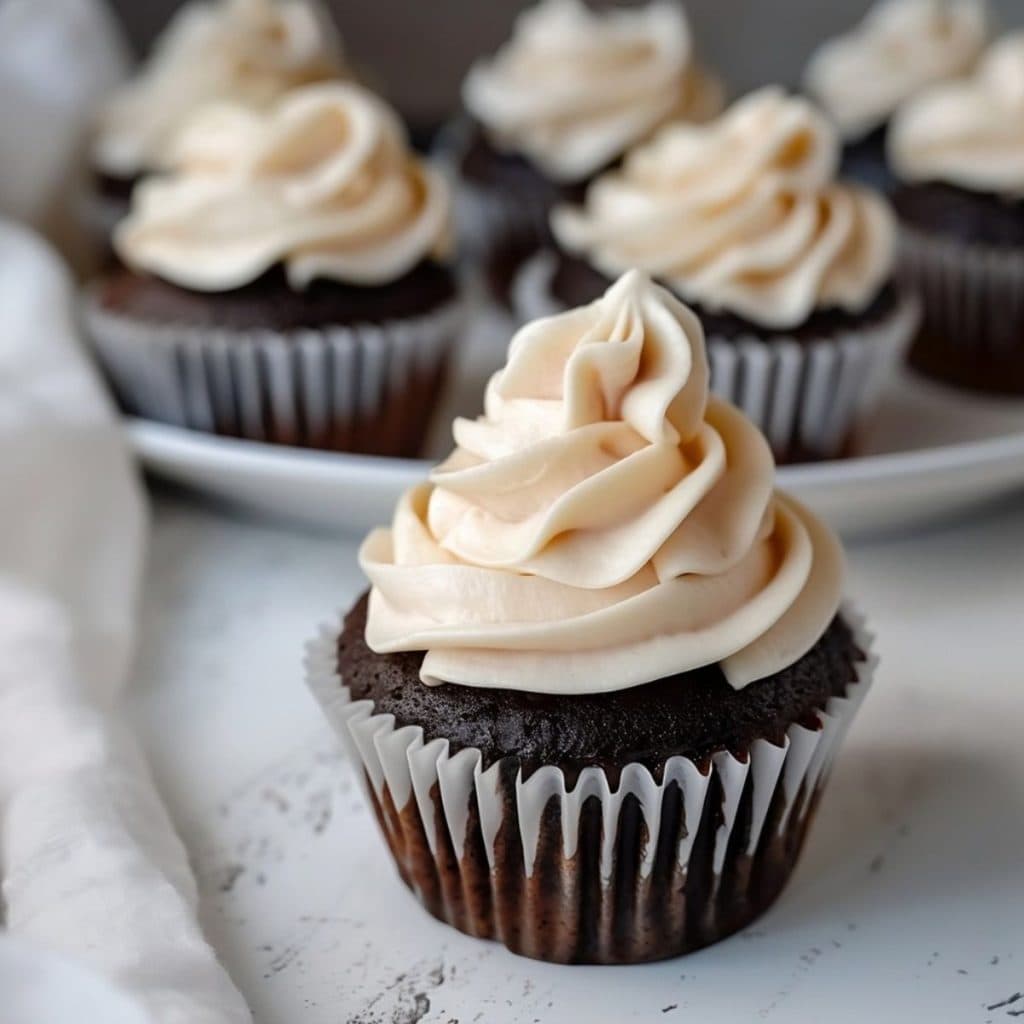 Guinness Chocolate Cupcakes topped with Irish Cream Frosting