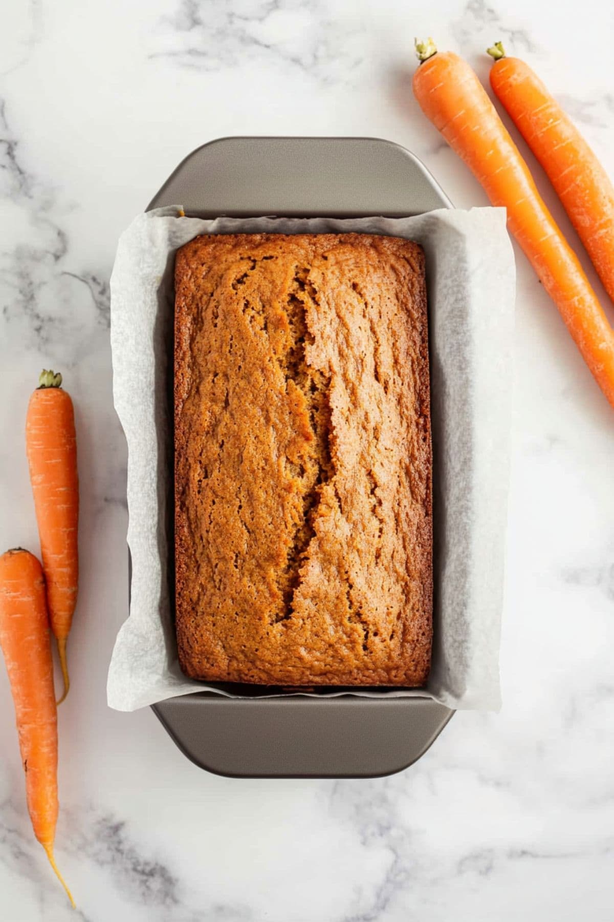 Carrot cake bread with loaf pan.