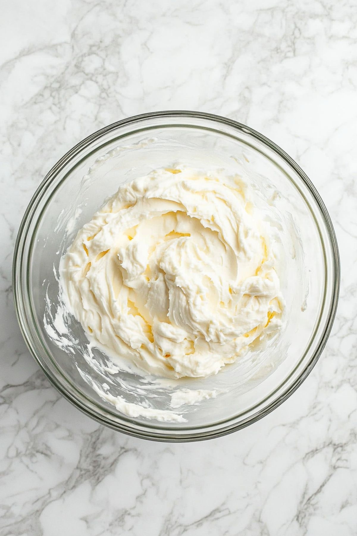 Cream cheese in mixing bowl.