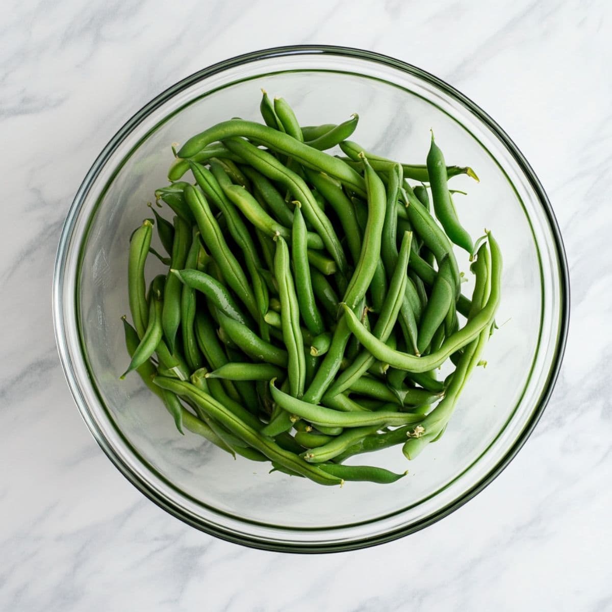 Fresh beans in a glass bowl. 