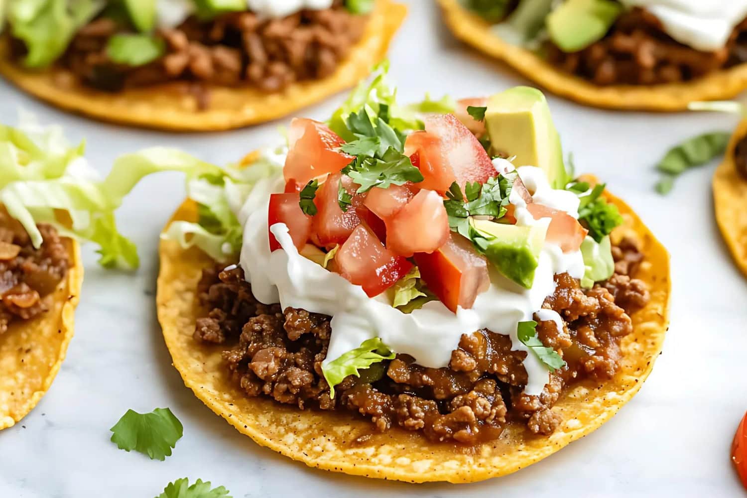 Crispy tostadas with seasoned beef and salsa.