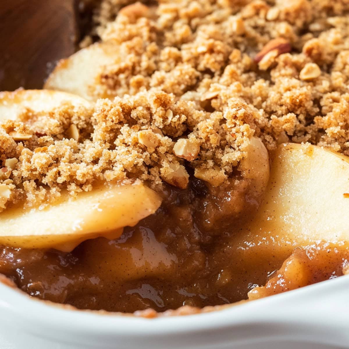 Peanut butter apple crisp baked in a rectangular baking dish.