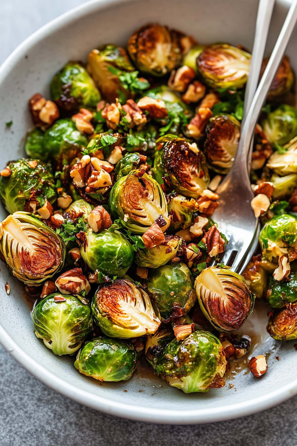 A bowl of maple roasted brussels sprouts.